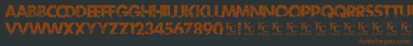 Urbanjungledemo-fontti – ruskeat fontit mustalla taustalla