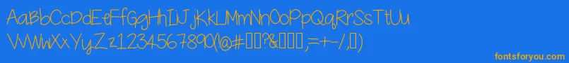 YesterdaysMakeup Font – Orange Fonts on Blue Background