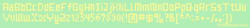 MrsKichinto Font – Yellow Fonts on Green Background