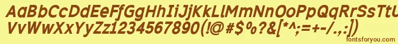 Excibi Font – Brown Fonts on Yellow Background