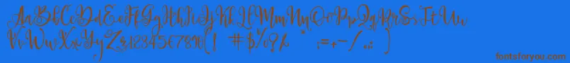 ParadisoVintageDemo-fontti – ruskeat fontit sinisellä taustalla
