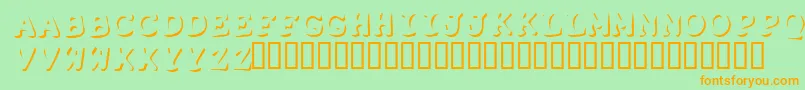 フォントShadowpuppets – オレンジの文字が緑の背景にあります。