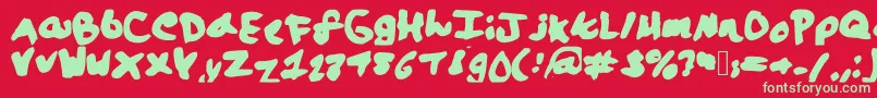 Fonte Lalaland – fontes verdes em um fundo vermelho