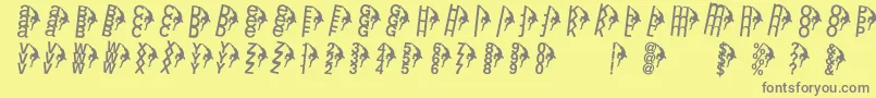 フォントRightclimbers – 黄色の背景に灰色の文字