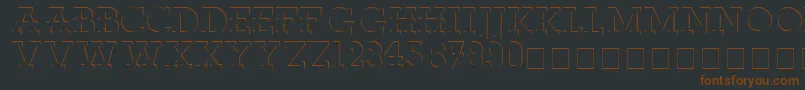 ReliefdecoMedium-fontti – ruskeat fontit mustalla taustalla