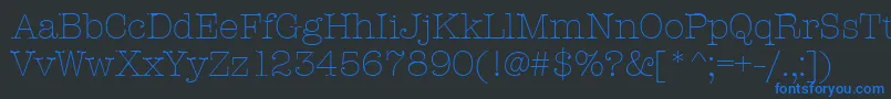 Czcionka AmtypewriteritcttLight – niebieskie czcionki na czarnym tle