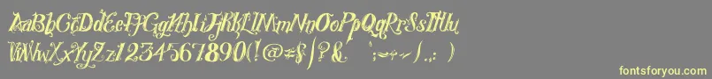 RoyalVanity Font – Yellow Fonts on Gray Background