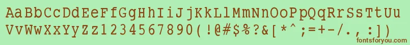 フォントSmalltypewritingmedium – 緑の背景に茶色のフォント