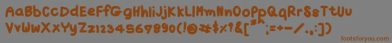 TxJello2-Schriftart – Braune Schriften auf grauem Hintergrund