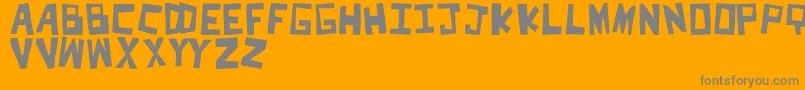 Cut Font – Gray Fonts on Orange Background