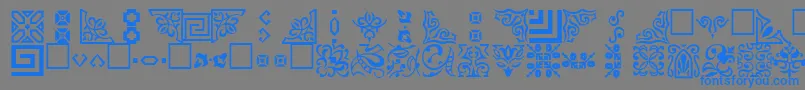 OrnamentttRegular-Schriftart – Blaue Schriften auf grauem Hintergrund