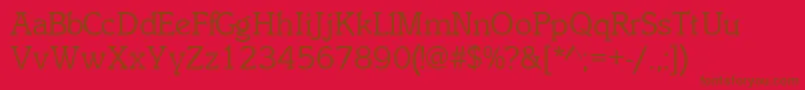 InclinatsskRegular-Schriftart – Braune Schriften auf rotem Hintergrund
