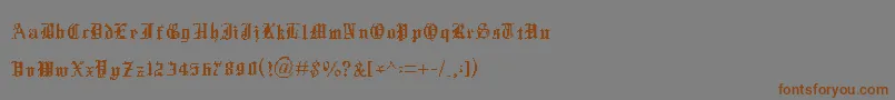 フォントXentype – 茶色の文字が灰色の背景にあります。