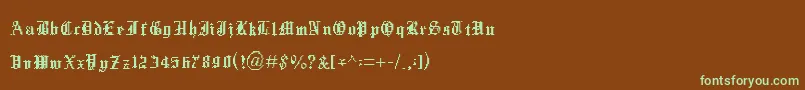 フォントXentype – 緑色の文字が茶色の背景にあります。