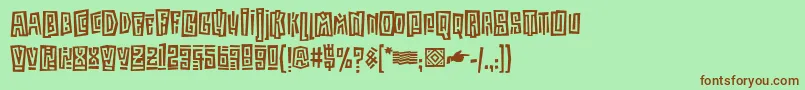 KokoaItc Font – Brown Fonts on Green Background