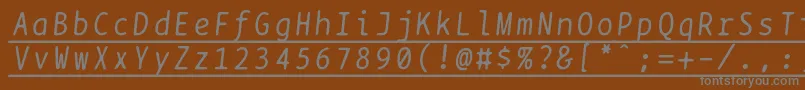 Bptypewriteunderscoreditalics-fontti – harmaat kirjasimet ruskealla taustalla