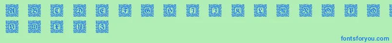 Czcionka Schmuck Initialen 2 – niebieskie czcionki na zielonym tle