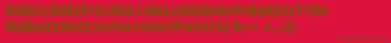 Xmasxpressacad-Schriftart – Braune Schriften auf rotem Hintergrund