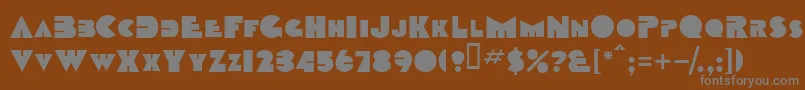 TobagosskBold-fontti – harmaat kirjasimet ruskealla taustalla