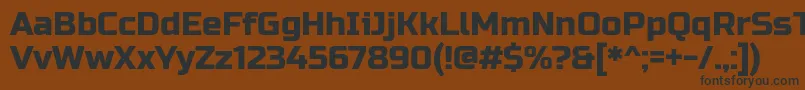 フォントRussoOne – 黒い文字が茶色の背景にあります