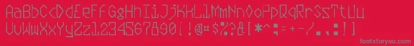 Czcionka Plasmaticgaunt – szare czcionki na czerwonym tle
