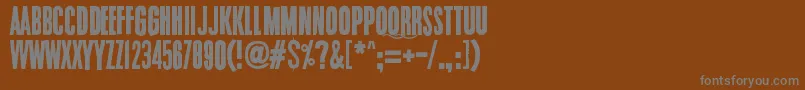 Endrophenomeua-Schriftart – Graue Schriften auf braunem Hintergrund