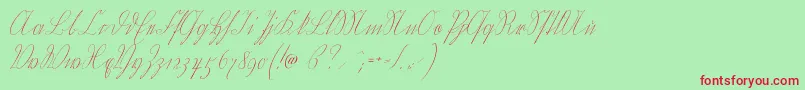 フォントWiegelkurrent – 赤い文字の緑の背景