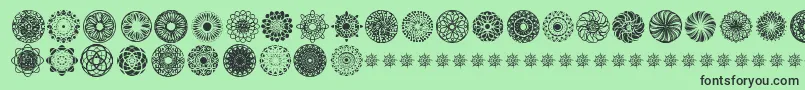 KaleidoscopicMind Font – Black Fonts on Green Background