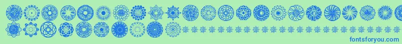 KaleidoscopicMind Font – Blue Fonts on Green Background