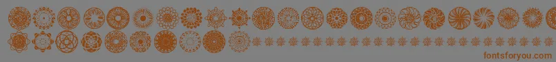 KaleidoscopicMind-Schriftart – Braune Schriften auf grauem Hintergrund