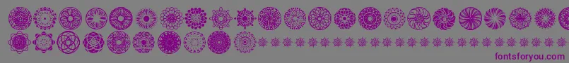 Czcionka KaleidoscopicMind – fioletowe czcionki na szarym tle