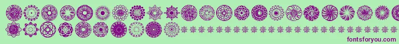 KaleidoscopicMind-Schriftart – Violette Schriften auf grünem Hintergrund