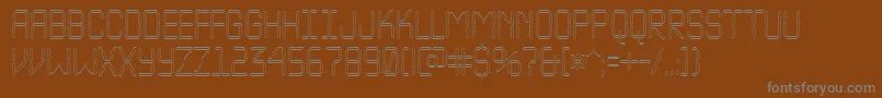 ALcdnovaotl-fontti – harmaat kirjasimet ruskealla taustalla