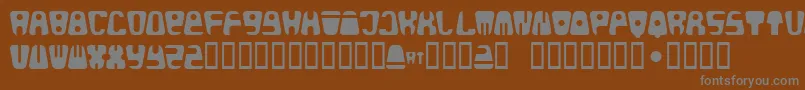 Bald-Schriftart – Graue Schriften auf braunem Hintergrund