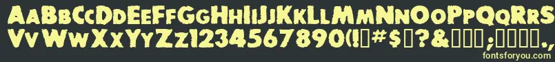 BaddogscapssskBold Font – Yellow Fonts on Black Background