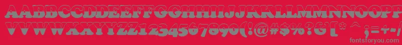 ACooperblacktiulbw-Schriftart – Graue Schriften auf rotem Hintergrund