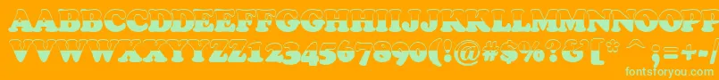 ACooperblacktiulbw-Schriftart – Grüne Schriften auf orangefarbenem Hintergrund