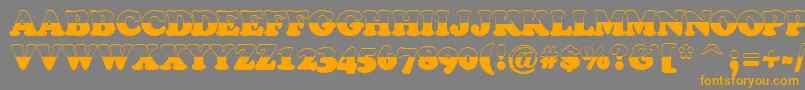 ACooperblacktiulbw-Schriftart – Orangefarbene Schriften auf grauem Hintergrund