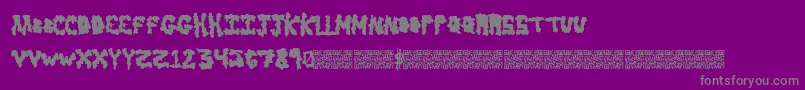 Earlyscare-fontti – harmaat kirjasimet violetilla taustalla