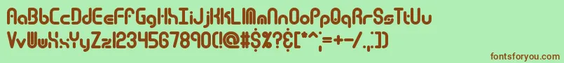 Techover Font – Brown Fonts on Green Background