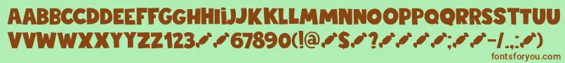 DkStickyToffee-fontti – ruskeat fontit vihreällä taustalla