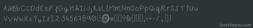 フォントKarebear – 黒い背景に灰色の文字