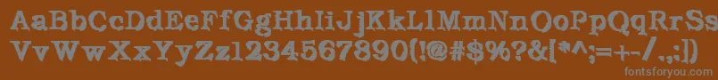 フォントDeFutura – 茶色の背景に灰色の文字