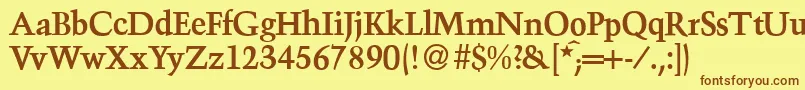 フォントTroubadourBold – 茶色の文字が黄色の背景にあります。