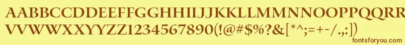 フォントWaterstitlingproSb – 茶色の文字が黄色の背景にあります。
