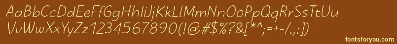 KasihItalic Font – Yellow Fonts on Brown Background