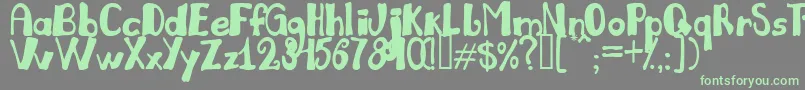 Julil Font – Green Fonts on Gray Background