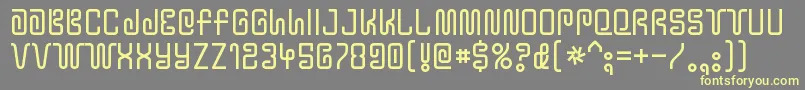 フォントYtwokbugRegular – 黄色のフォント、灰色の背景