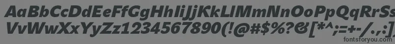 JohnsansHeavyProBoldItalic-fontti – mustat fontit harmaalla taustalla