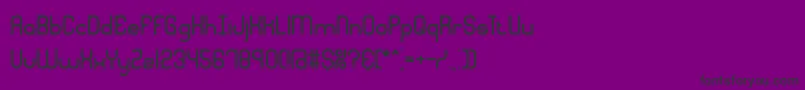 フォントQuadraticBrk – 紫の背景に黒い文字